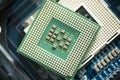 Macro shot of CPU against electric circuit board or motherboard Royalty Free Stock Photo
