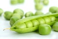 Macro shot of cracked pod and green peas Royalty Free Stock Photo