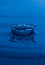 Blue crown of water with ripples Royalty Free Stock Photo