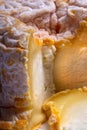 Macro shot of a cut through a Langres cheese Royalty Free Stock Photo
