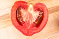 Macro shot of a cut of a ripe juicy tomato Royalty Free Stock Photo