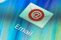 Macro shot of email mobile application icon on Android phone screen. Common emailing app