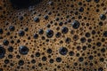 Macro shot of espresso foam. Coffee background.