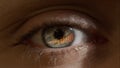 Macro shot of eyes with growth chart reflection. Business development competition concept Royalty Free Stock Photo
