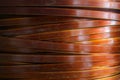 Macro shot of flat copper coil windings of high-voltage distribution transformer Royalty Free Stock Photo
