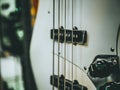 Macro shot of four strings electric bass guitar Royalty Free Stock Photo