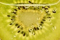 Macro Shot Of A Fresh Kiwi With Bubbles Royalty Free Stock Photo