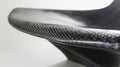 A macro shot of a furniture piece made of adaptive material featuring a sleek and modern design. The material seems to