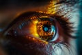Macro shot of a human eye reflecting digital data and circuitry patterns, illuminated with warm and cool contrasting