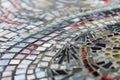 macro shot of intricate glass tesserae in a mosaic design