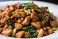 macro shot of Kung Pao Chicken stir-fried with Sichuan peppercorns, giving it a unique and numbing flavor,