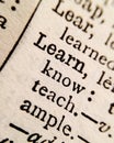 Macro shot of `Learn` in a dictionary page Royalty Free Stock Photo