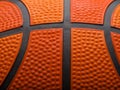 Macro shot. Leather orange basketball. Details. Abstraction. Minimalism. Sports background. Sports games, competitions, champions Royalty Free Stock Photo