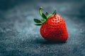 Macro shot of a luscious strawberry, with its vivid red surface and seed-speckled texture Royalty Free Stock Photo