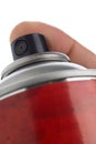 Macro shot of a male hand holding a spray can