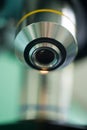 Macro shot of microscope lens with yellow strip Royalty Free Stock Photo