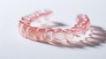 Macro shot of molars and a transparent orthodontic retainer emphasizing dental care and orthodontic treatment.