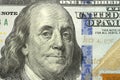 Macro shot of a new 100 dollar bill, portrait of US president Benjamin Franklin. 100 dollar bill with a close-up Royalty Free Stock Photo