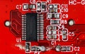 macro shot of an old damaged orange or red circuit board Royalty Free Stock Photo