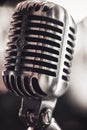 Macro shot of an old vintage silver microphone