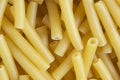 Macro shot pasta noodles texture. Macaroni background pattern. Top view. Dry pasta for cooking. Abstract italian macaroni