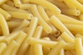 Macro shot pasta noodles texture. Macaroni background pattern. Top view. Dry pasta for cooking. Abstract italian macaroni