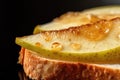 macro shot of pear slice on toasted bread Royalty Free Stock Photo