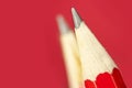 Macro shot of a pencil on red background Royalty Free Stock Photo