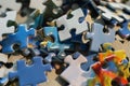 Macro shot of a pile of puzzle pieces