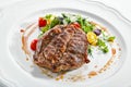 Pork Neck Steak with Mixed Salad on White Restaurent Plate Royalty Free Stock Photo