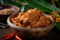 Macro shot of Rendang curry paste, made from a blend of flavorful spices, chili peppers, and coconut milk