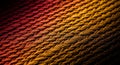 Macro Close-up of Woven Fabric with a Gradient of Red, Orange, and Yellow Hues textile texture Royalty Free Stock Photo