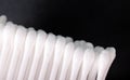 Macro shot set of white cotton swabs on black Royalty Free Stock Photo