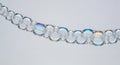 Chain of Iridescent Soap Bubbles Royalty Free Stock Photo