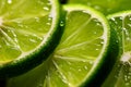 A macro shot of a sliced lime with green zest