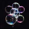 Macro Shot of Soap Bubbles with Iridescent Colors on Black Background Royalty Free Stock Photo