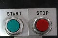 Macro shot of start and stop red and green mechanical buttons Royalty Free Stock Photo