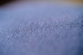 Macro shot of the textile garmet - thin exclusive blue color Royalty Free Stock Photo