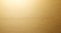 Soft Focus Close-up of a Textured Golden Surface with Subtle Lighting background Royalty Free Stock Photo