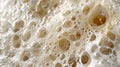Macro shot of a textured surface with tightlypacked bubbles resembling a dense and bubbly foam Royalty Free Stock Photo