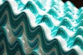 macro shot of toothpaste squeezed out in a zigzag pattern