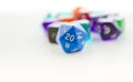 Macro shot of twenty sided dice with other dice Royalty Free Stock Photo