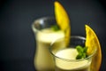 Macro shot of two glasses of mango lassi Royalty Free Stock Photo