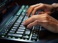 Macro shot of typing hands on wireless keyboard