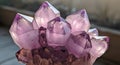 Macro shot of a vibrant amethyst geode cluster with sharp, translucent purple crystals catching the light Royalty Free Stock Photo