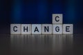 Macro shot of wooden cubes on a table showing the word CHANGE or CHANCE Royalty Free Stock Photo
