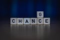 Macro shot of wooden cubes on a table showing the word CHANGE or CHANCE Royalty Free Stock Photo