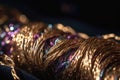 Macro shot of woven fabric with metallic threads and shiny accents