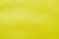 Macro shot yellow leather texture background.. Part of perforated leather details. Yellow perforated leather texture background. Royalty Free Stock Photo