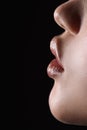 Macro side view of sensual lips and chin